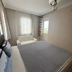 Апартаменты Sea View W Garden 50m To Sarimsakli Айвалык